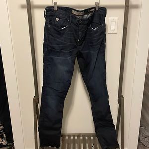 Guess “stretch” slim tapered jeans